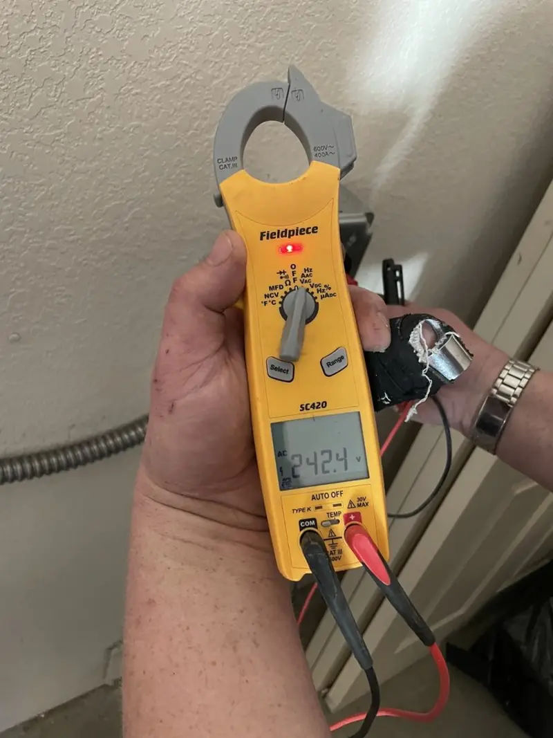 Voltage testing with clamp meter during Aluminum Wiring Replacement in Solon